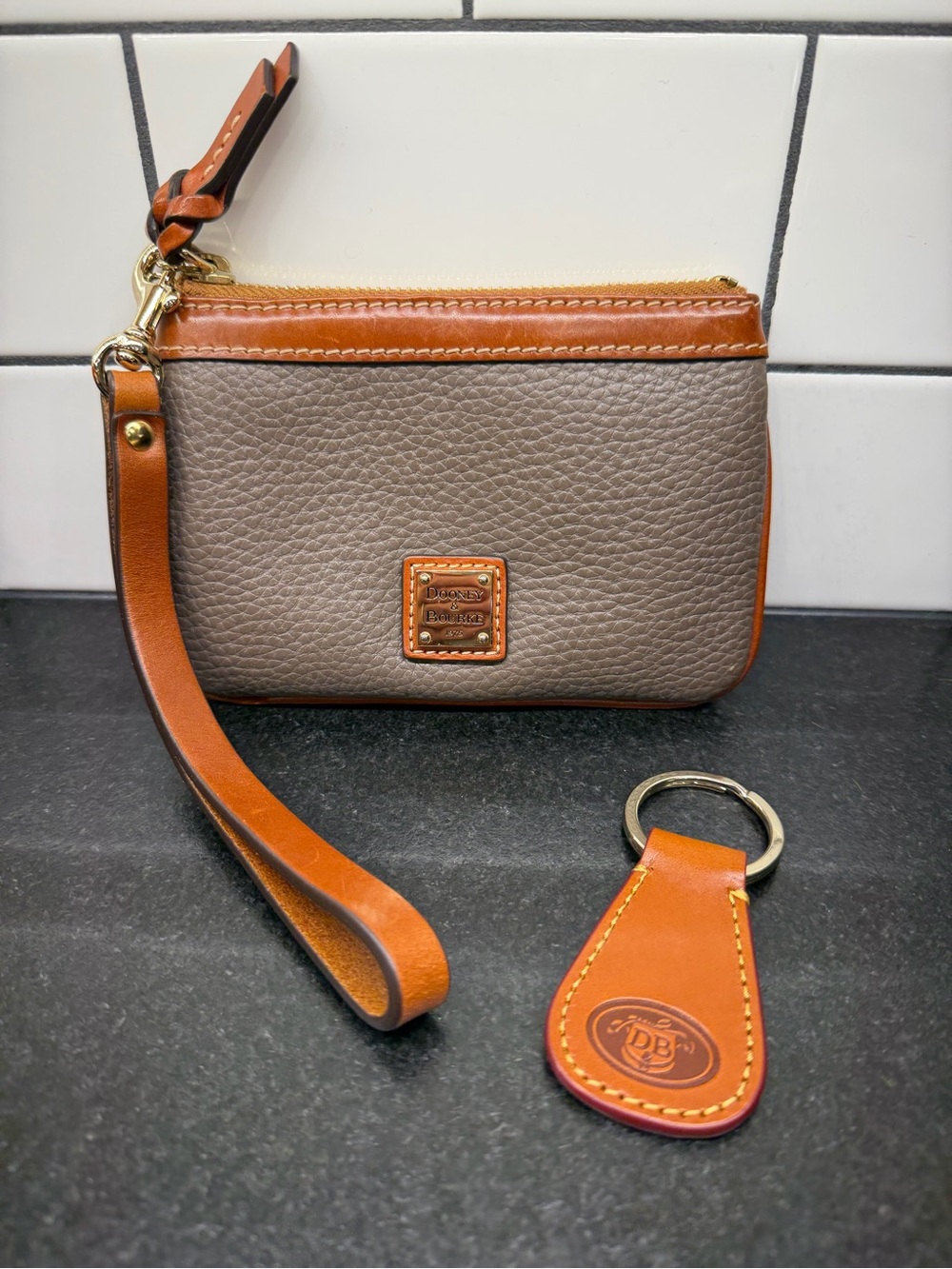 Dooney & Bourke Elephant color Pebble Leather Wristlet with Saddle Trim